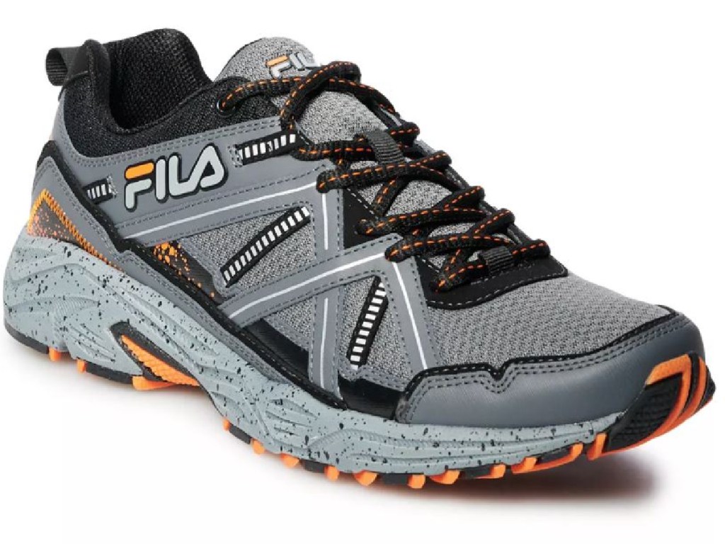 black, orange and grey shoe on white background