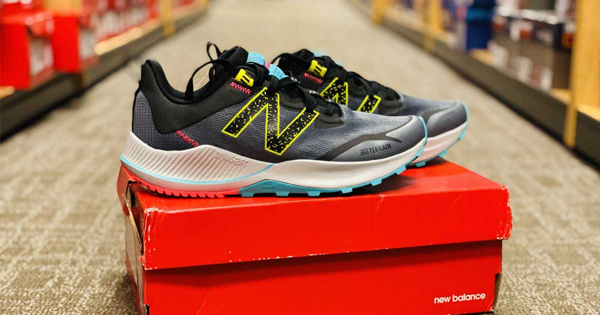 women's running shoes on box in aisle of store