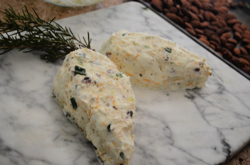 forming a pinecone cheese ball on a tray