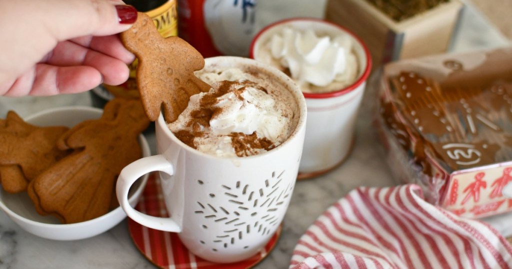 putting a gingerbread cookie in gingerbread latte