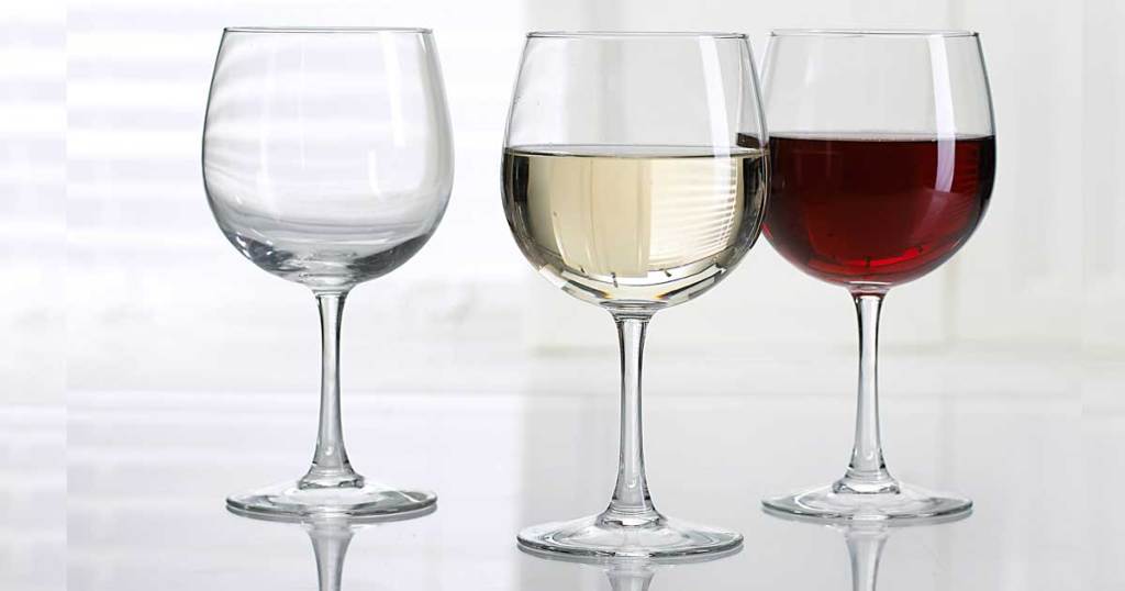 white and red wine in three wine glasses