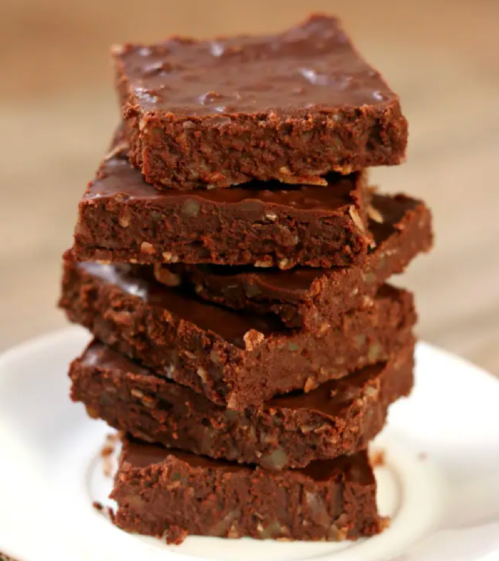 A stack of Coconut Pecan fudge, one of our 2 ingredient crock pot meals