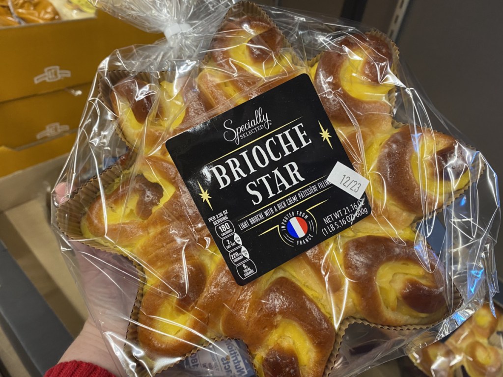 hand holding brioche star in store at aldi 