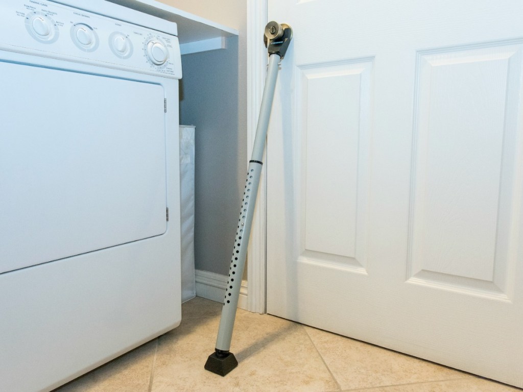 Security bar under door handle