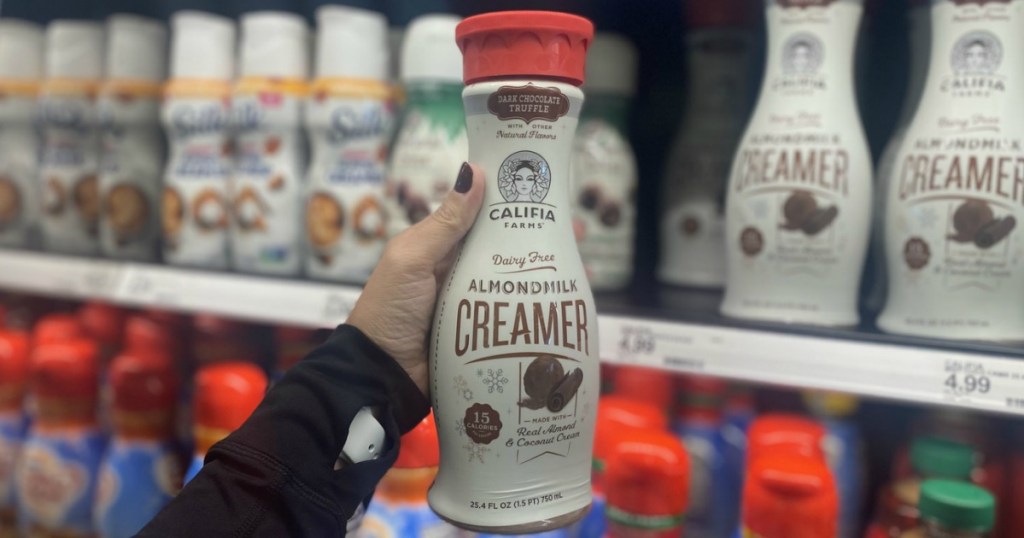 hand holding Califia Farms Dark Chocolate Truffle Creamer