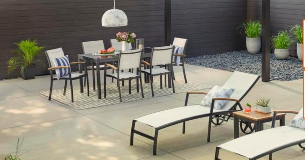 Hampton Bay Patio Set set up outside in white