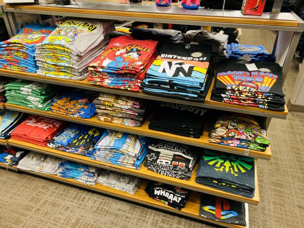 display of men's shirts on tables at Kohl's