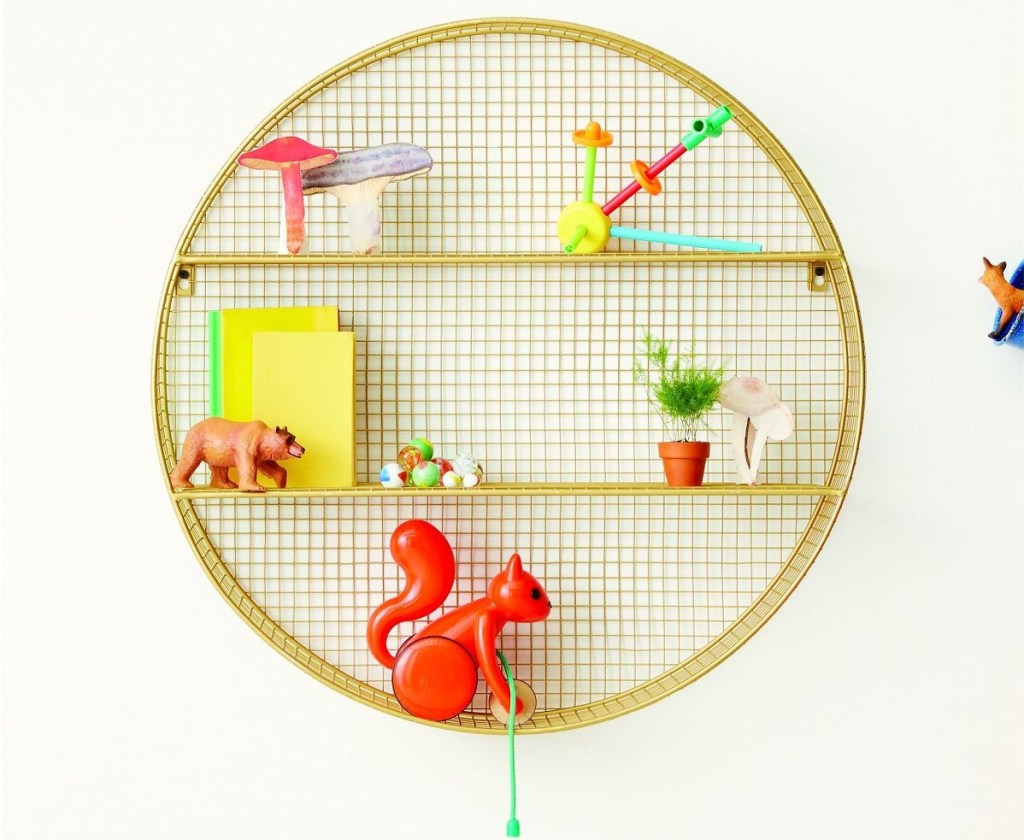 circle shelf with toys on it