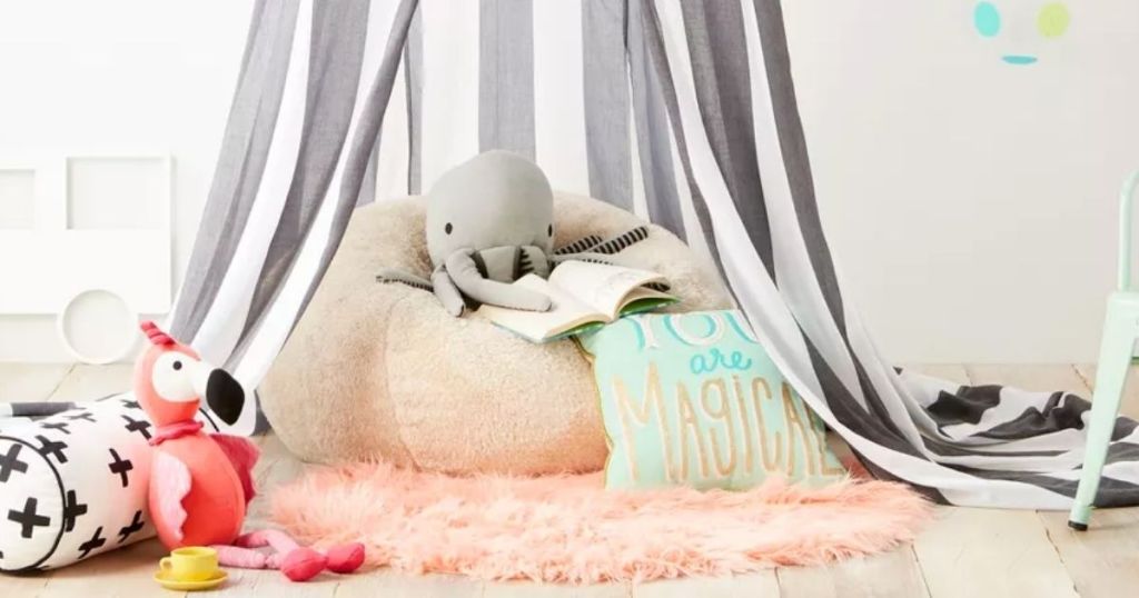 kids bedroom with toys and rug