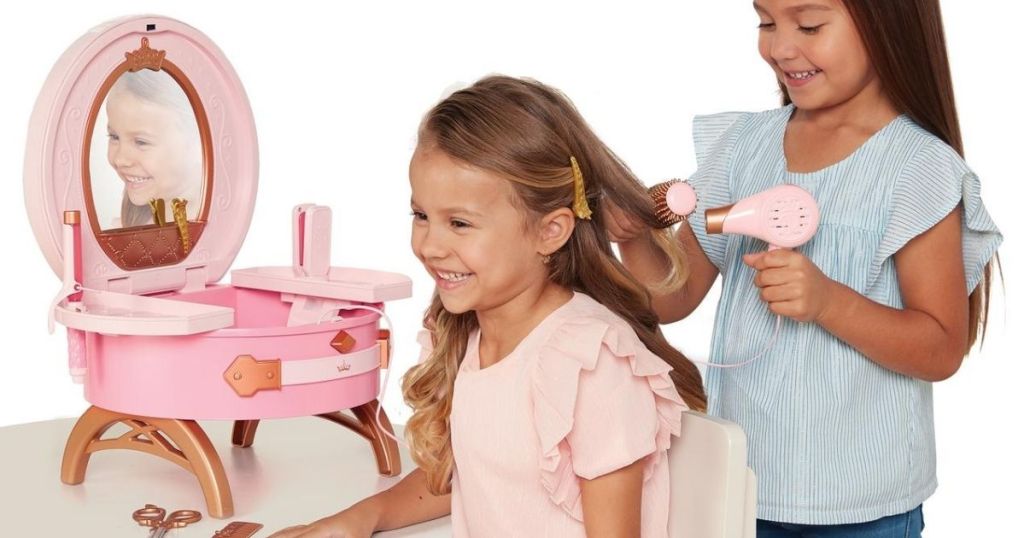 girl styling another girls hair