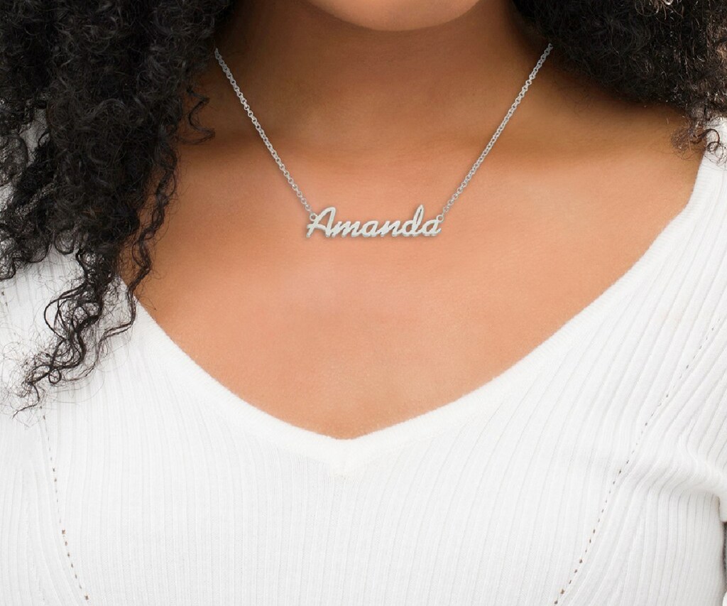 woman wearing name necklace