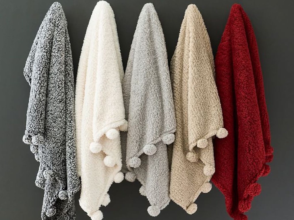 cozy pom pom throw blanket