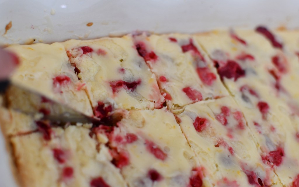 cutting cranberry cake