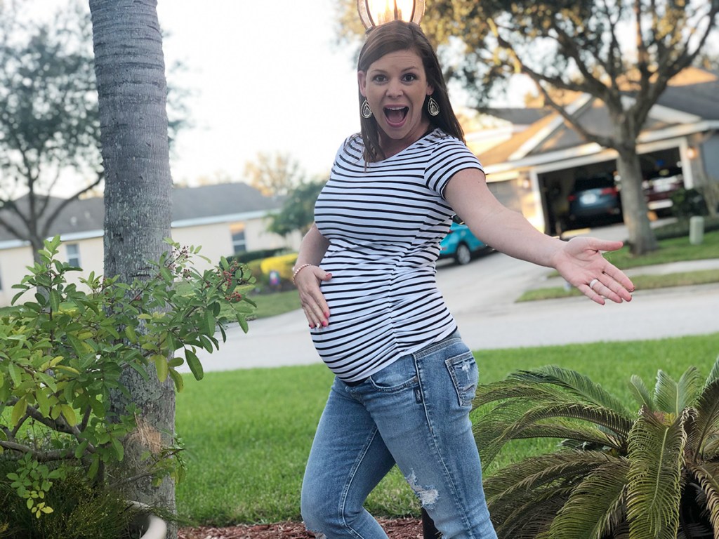 woman wearing maternity jeans