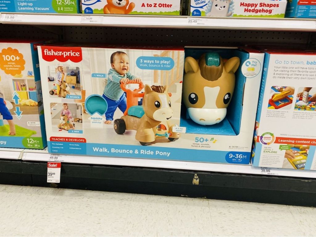 Fisher-Price walk bounce and ride pony on store shelf