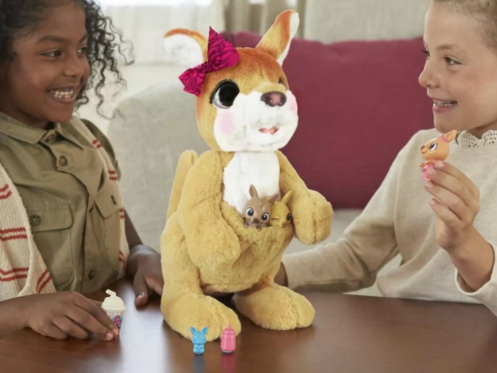 two girls playing with furReal Mama Josie the Kangaroo Interactive Pet Toy