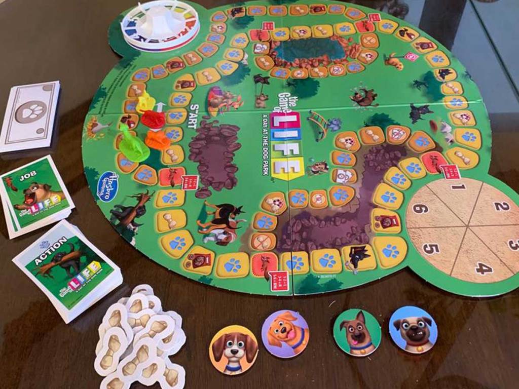 game of life dog edition set up on table