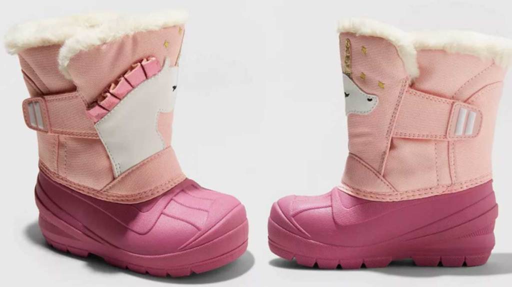 girls winter boots unicorns stock image