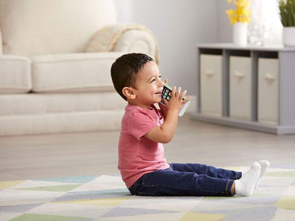 boy using Leapfrog phone
