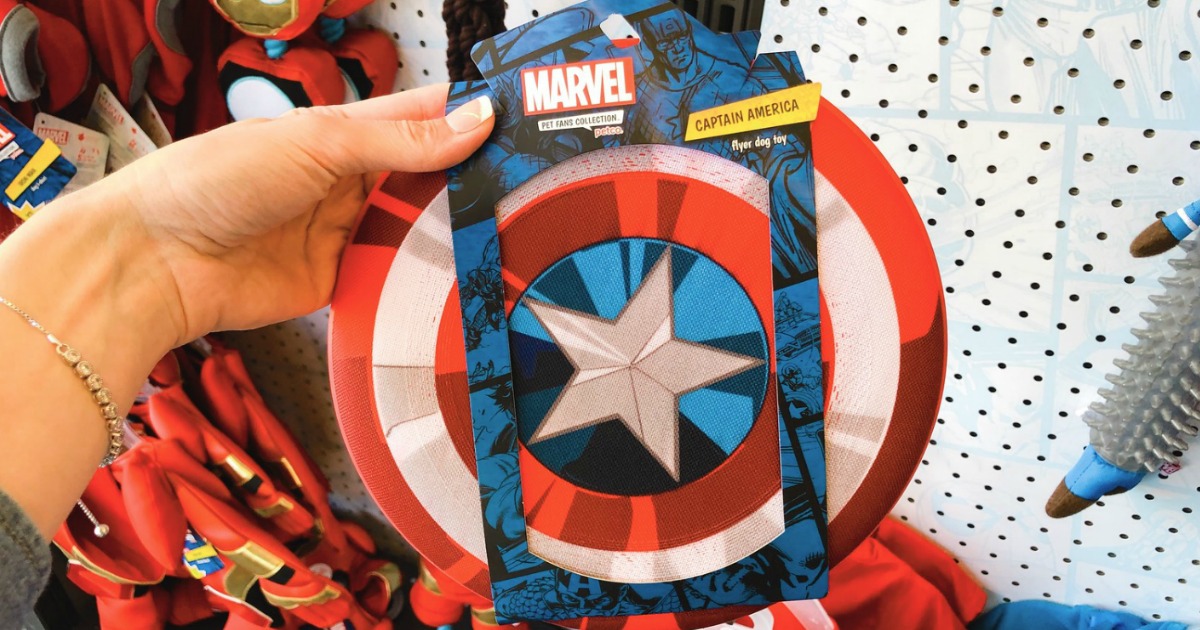 hand holding a captain america shield dog flyer frisbee toy