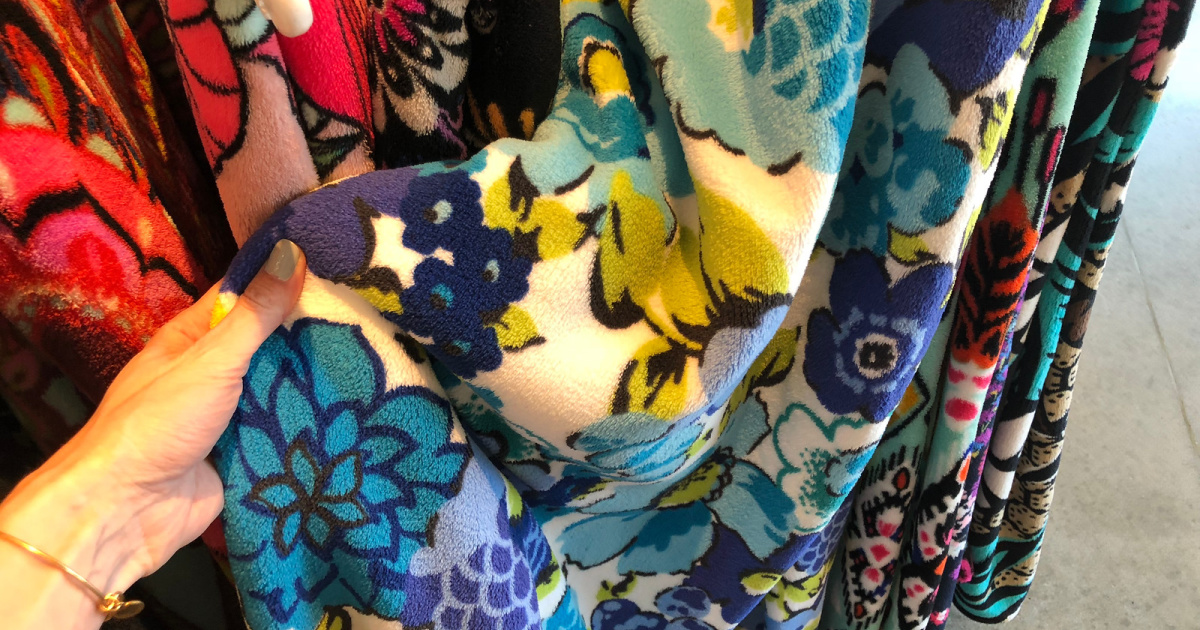 vera bradley plush blanket in hand in store