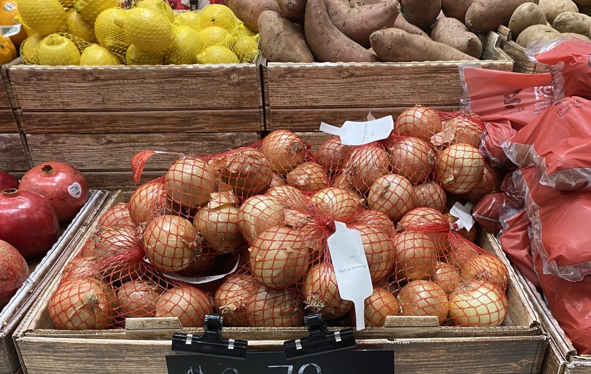 yellow onions in bag in store at target