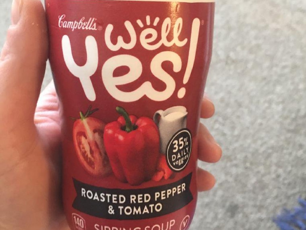 hand holding Campbell's Well Yes! Soup