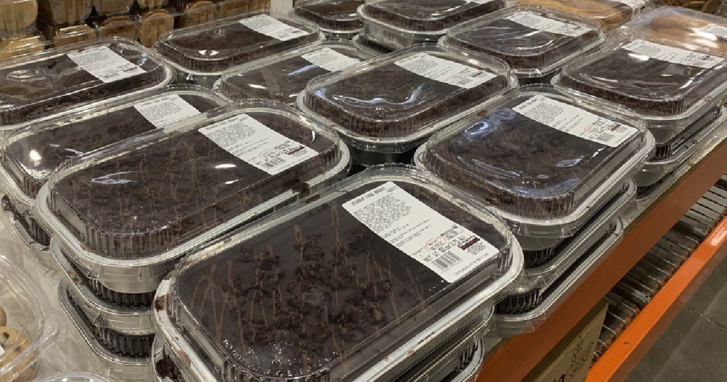 large fudge brownie containers on display table in store