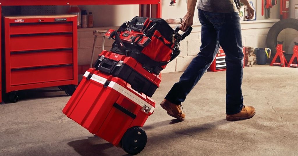 man pulling tower with Craftsman VersaStack Cooker