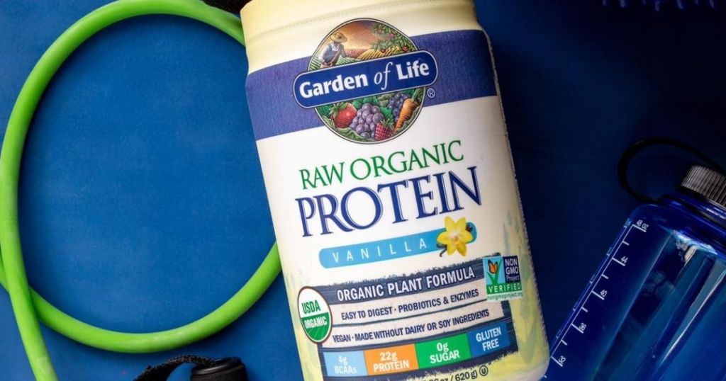 Garden of Life Protein powder container by a water bottle