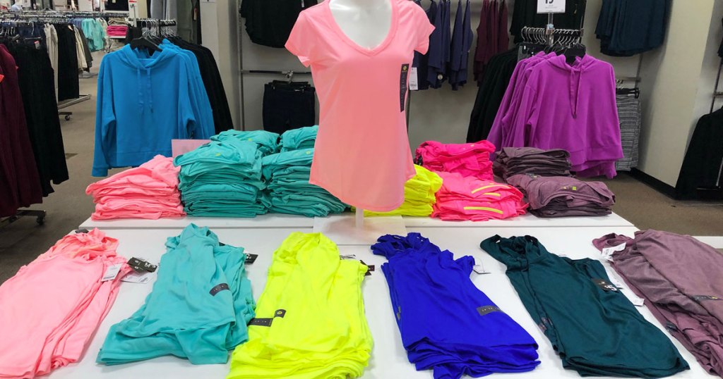 display of women's xersion activewear tops at jcpenney