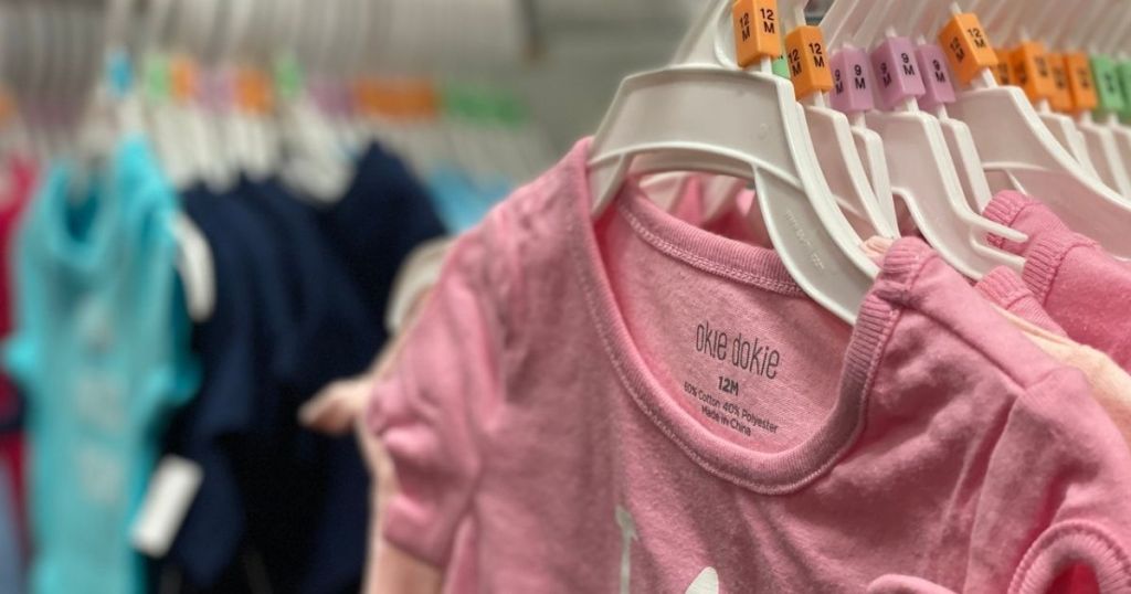 JCPenney Okie Dokie Baby Outfits hanging in store