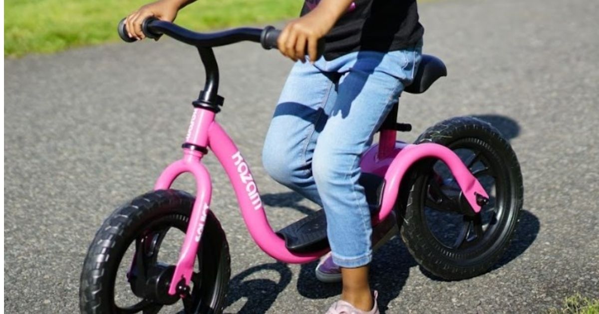 girl riding KaZAM Bike in pink