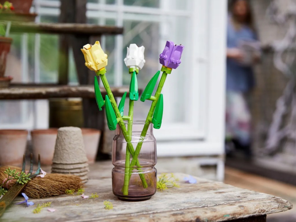 LEGO Tulips Set sitting on a vase in the middle of a living room