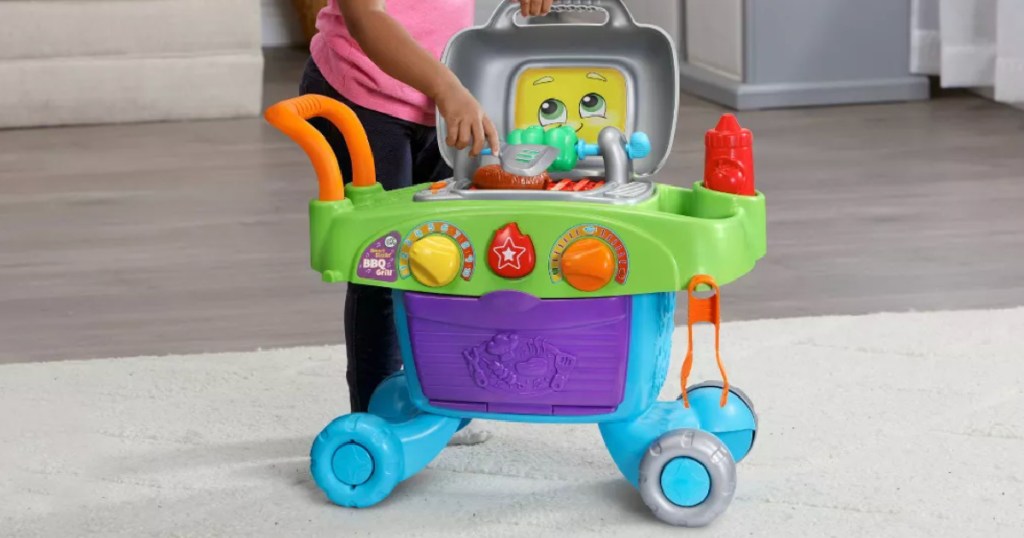 child playing with LeapFrog Smart Sizzlin' BBQ Grill