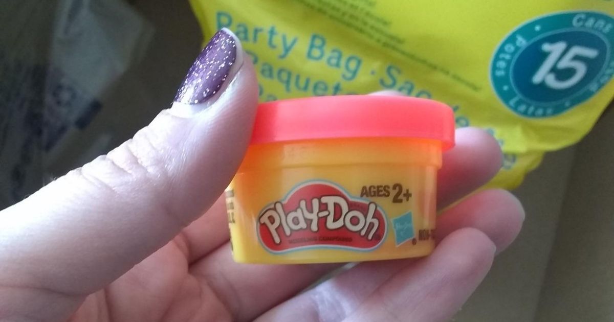 hand holding Mini Play-Doh Party Pack