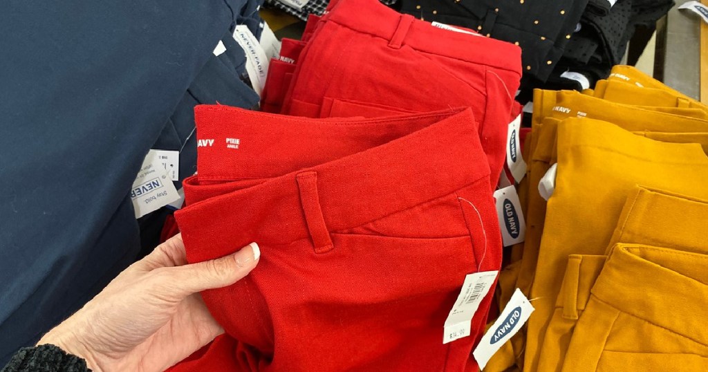 hand holding a pair of red old navy pixie pants