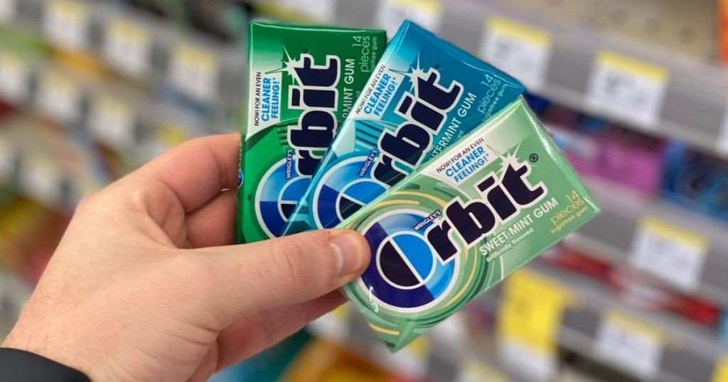 hand holding 3 Orbit Single Pack Gums