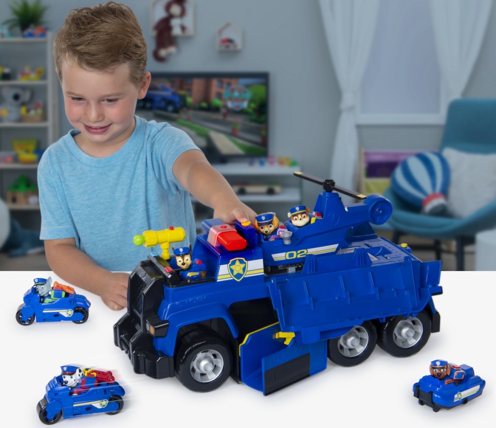 boy playing with PAW Patrol Chase’s 5-in-1 Ultimate Cruiser with Lights and Sounds