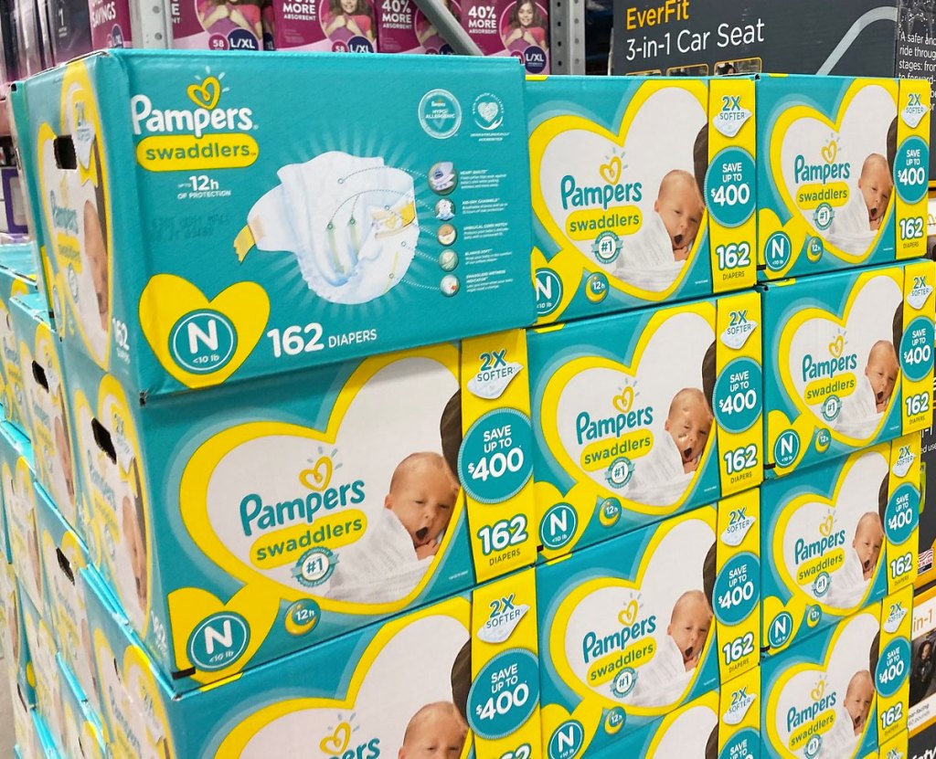 blue and yellow boxes of pampers swaddlers diapers at sam's club