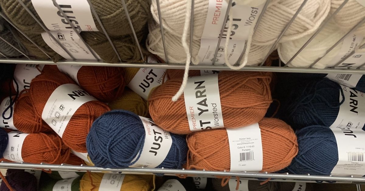 skeins of yarn on display at dollar tree