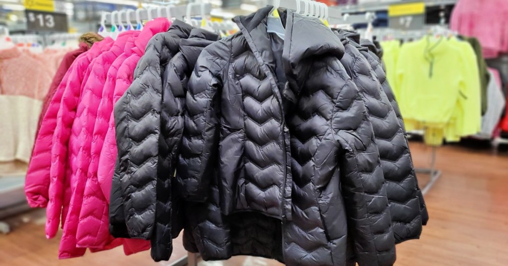 Time and Tru Women's Packable Puffer Jacket with Hood on rack at Walmart