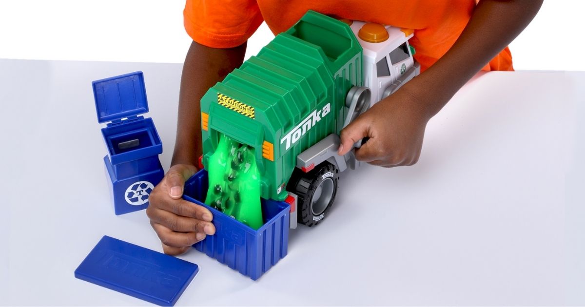 child playing with Tonka Mega Machines Garbage Truck w/ Slime