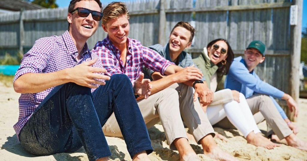 group of people sitting in a row