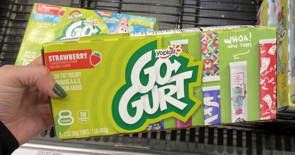 hand holding a box of gogurt