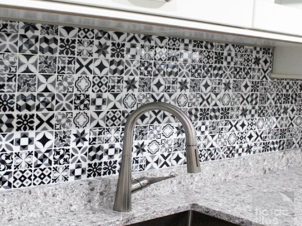 pretty morrocan peel and stick backsplash in a kitchen