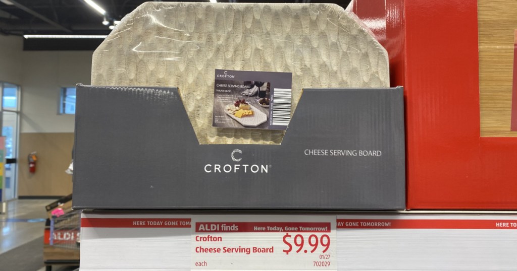shelf with crofton cheese serving board