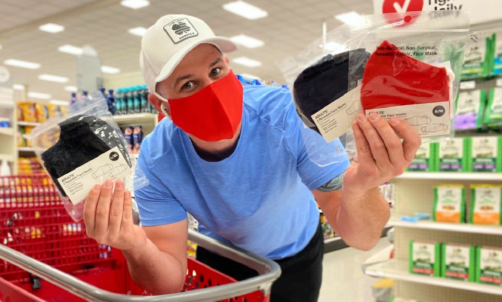 man holding face masks at Target