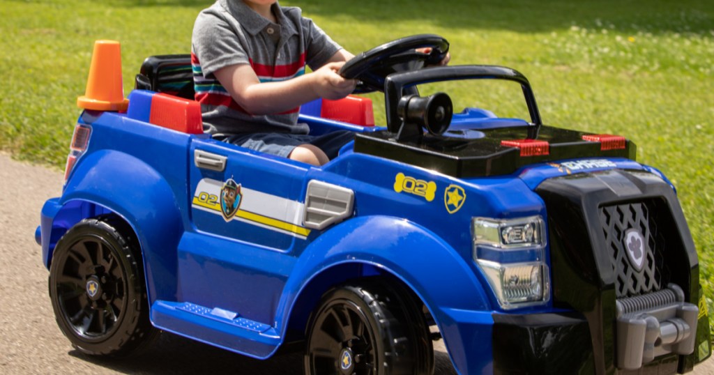 little boy on paw patrol chase vehicle