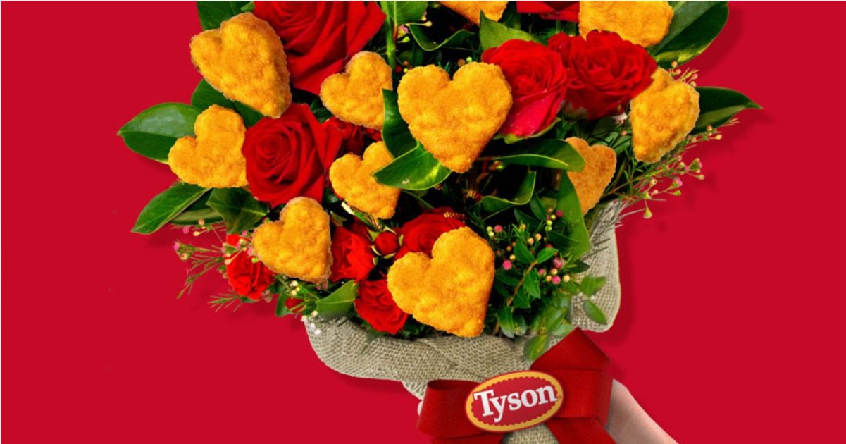 holding bouquet of roses and heart-shaped chicken nuggets